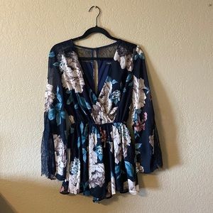 NAVY AND FLORAL ROMPER